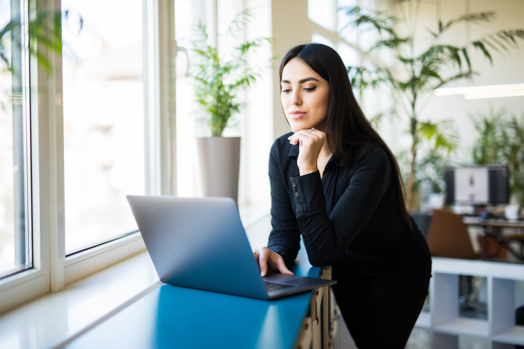 lady at laptop thinking